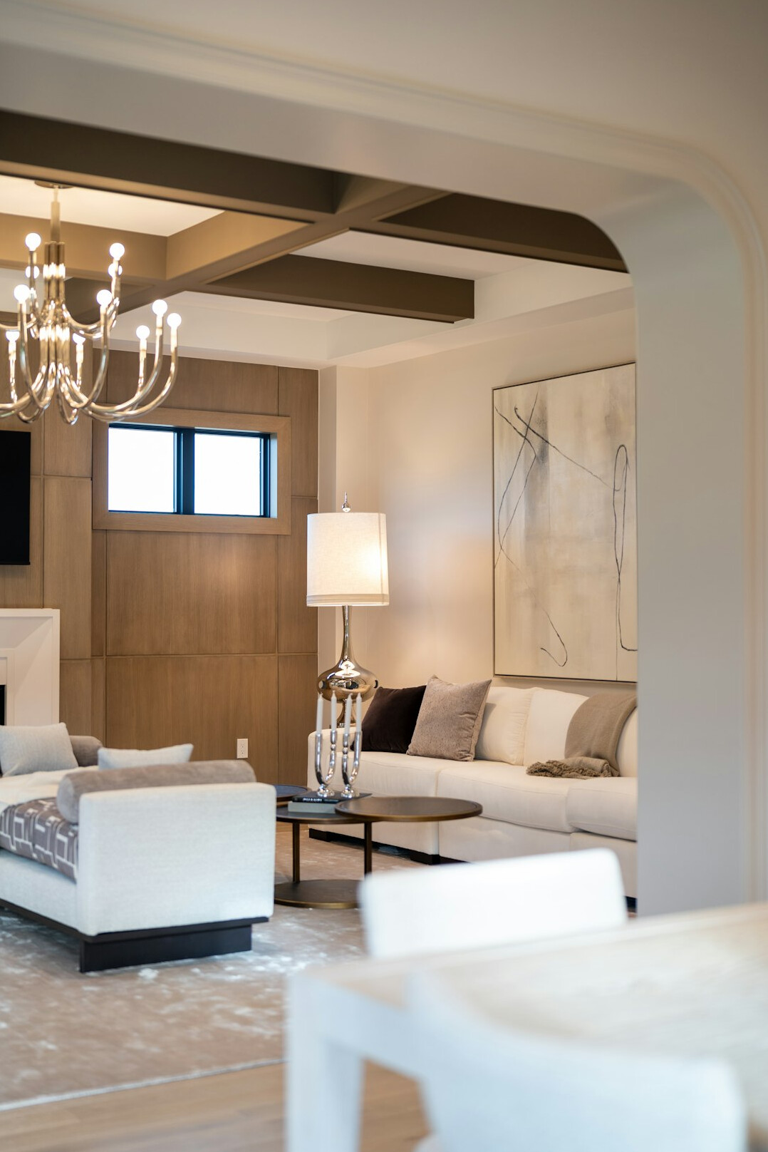 Elegant living room with wooden beams and designer furniture